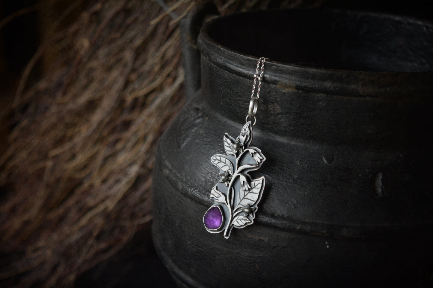 Belladona botanical pendant with faceted amethyst